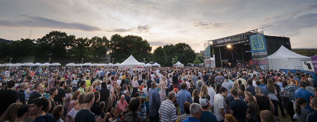 A large crowd watches a Three Rivers Arts Festival performance at the Dollar Bank Main Stage in Point State Park.