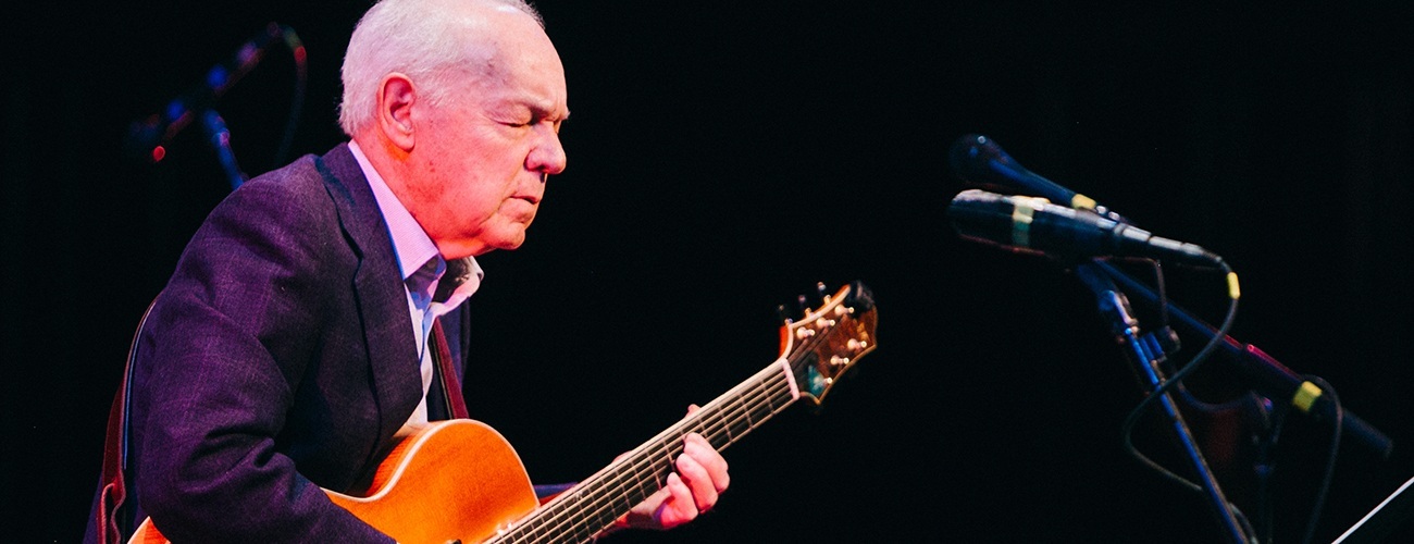 joe negri playing guitar at the greer cabaret theater