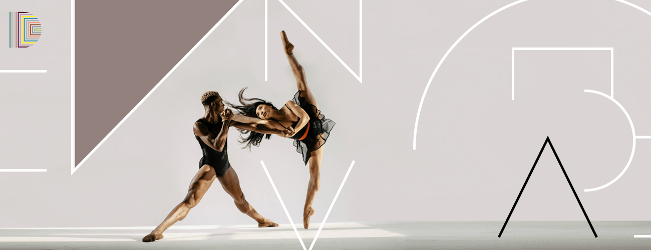 dancer on pointe supported by fellow dancer
