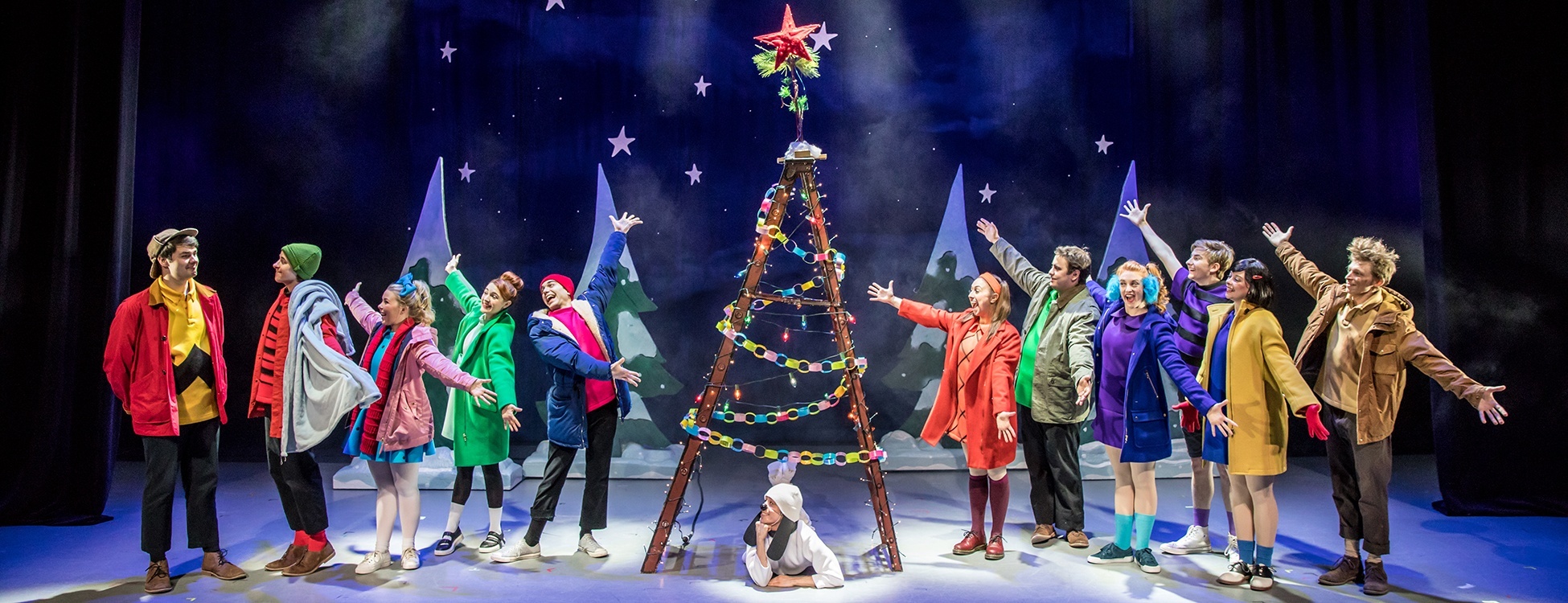 performers in a charlie brown christmas on stage