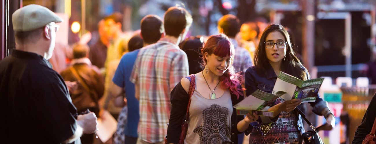 women attending gallery crawl in downtown Pittsburgh