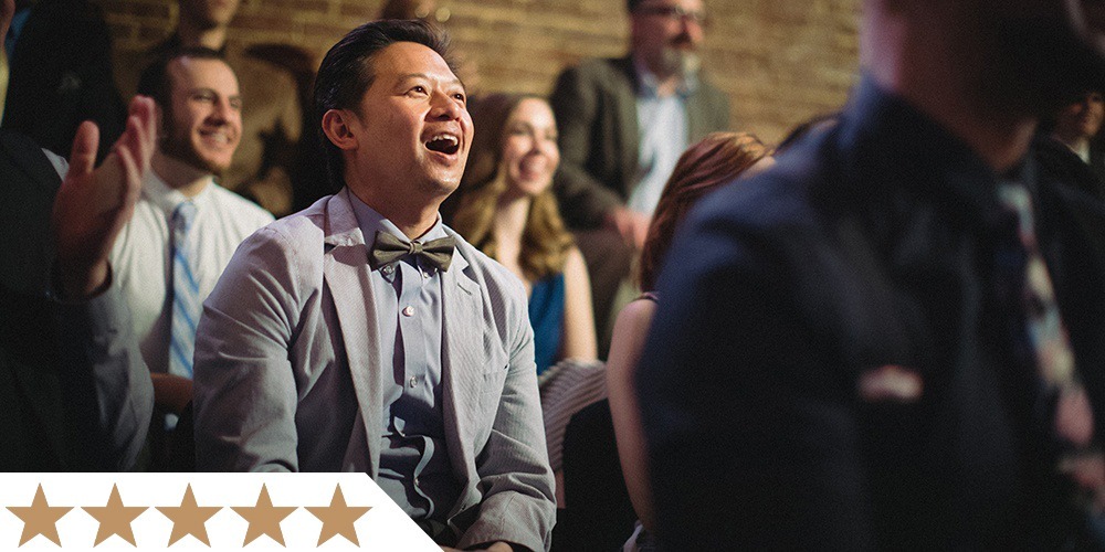 an onlooker's amazed reaction to a performance happening on stage
