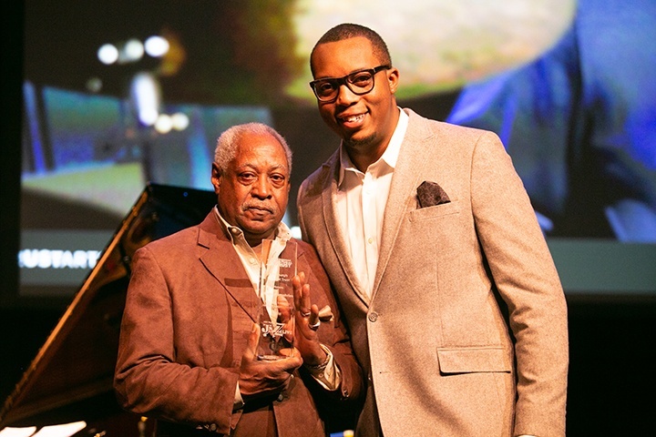A photo of Roger Humphries and Jevon Rushton following the presentation to Roger of the inaugural JazzLive Legacy Award by Rushton