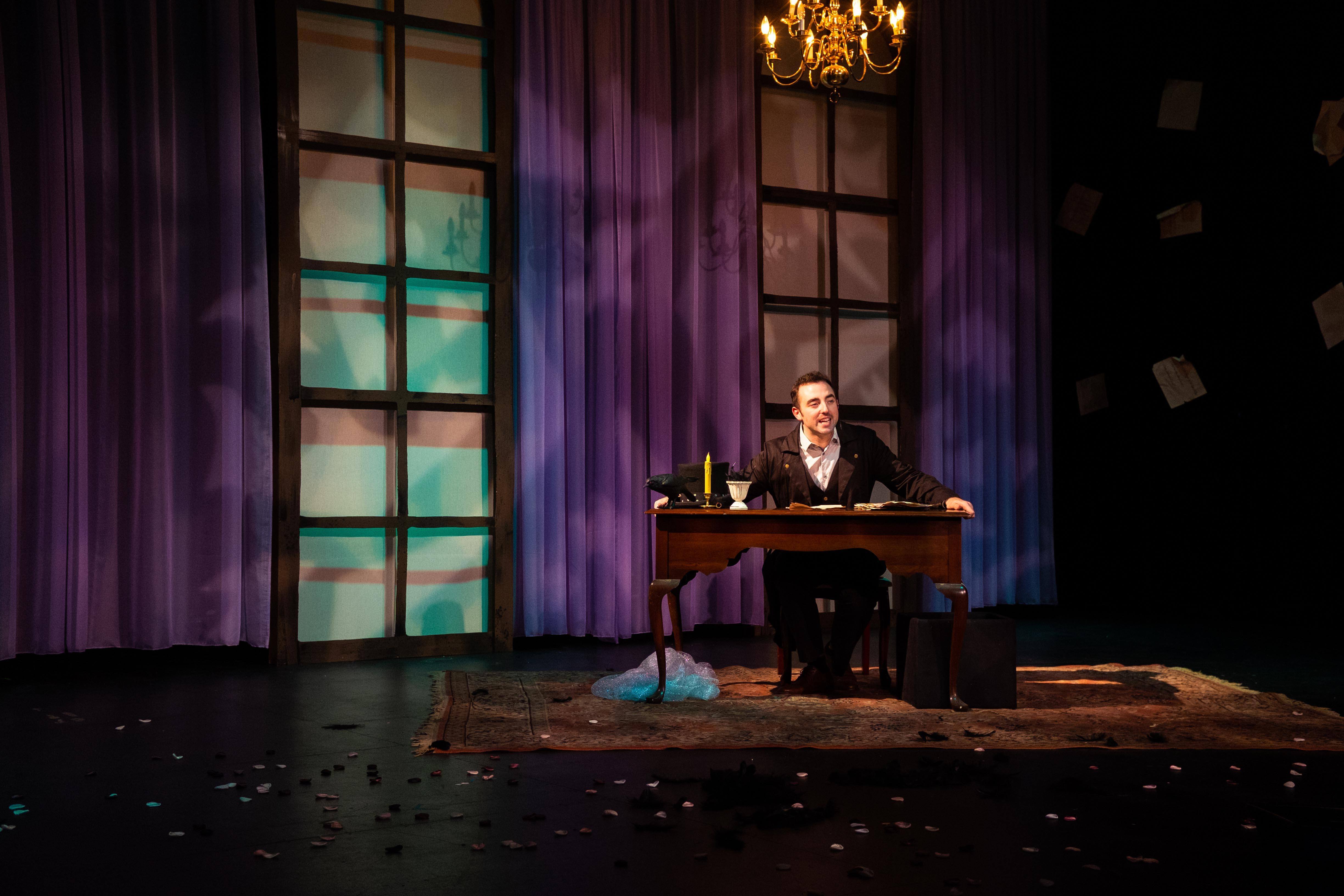 Edgar alone at his desk