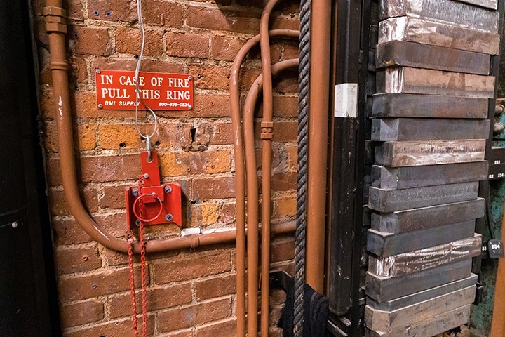 a photo of the backstage ripcord that is pulled to drop the curtain in an emergency situation