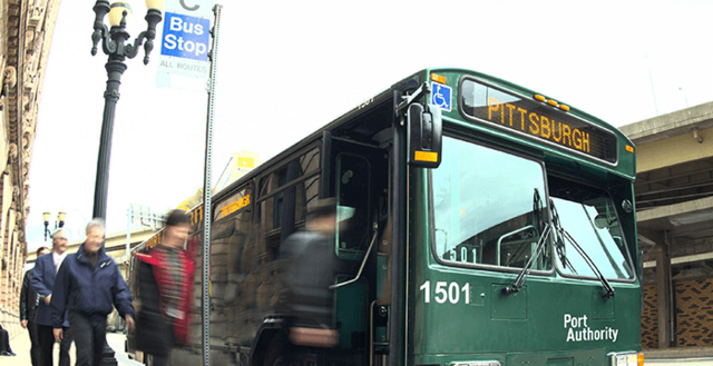 People getting on Port Authority Bus in Pittsburgh