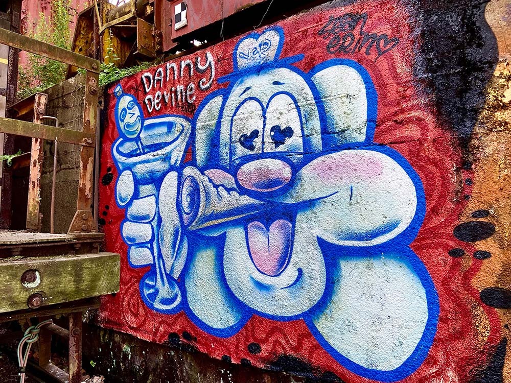 a spray painted cartoon dog face