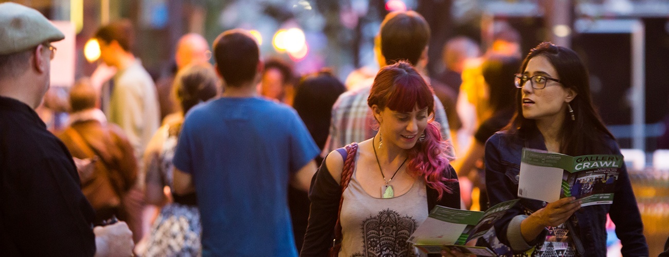 patrons walking down Liberty Avenue during a Gallery Crawl