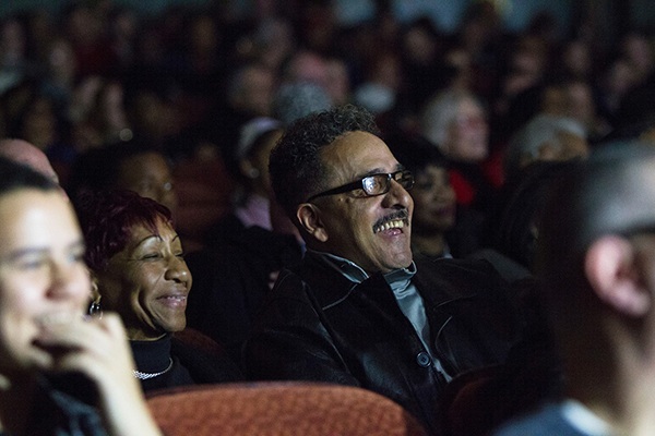 man laughing at a comedy event in Pittsburgh
