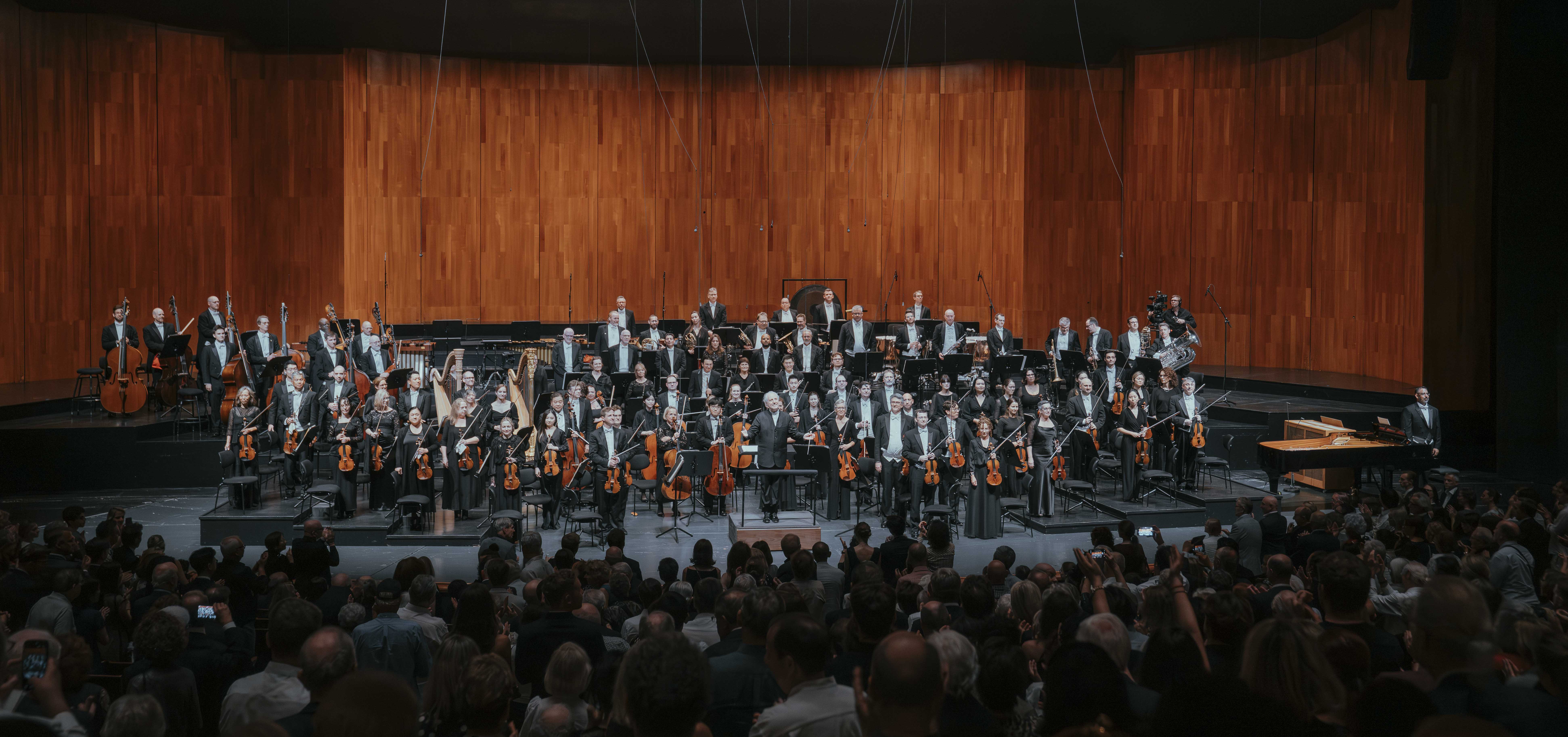 Pittsburgh Symphony musicians performing onstage