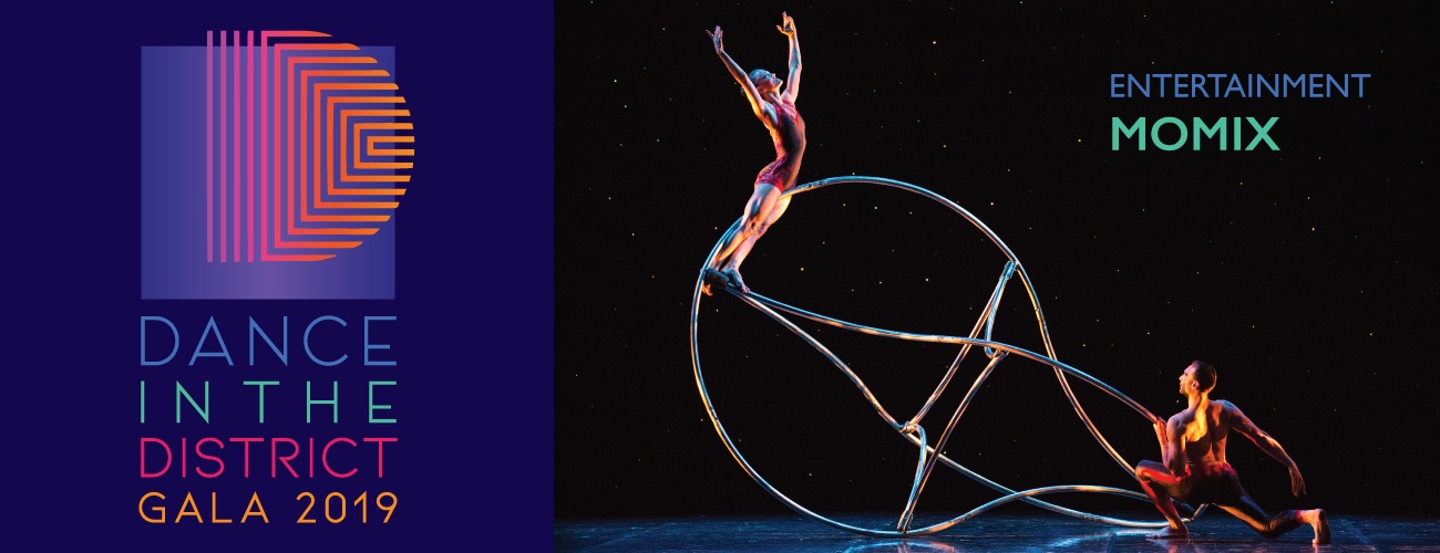 Two Momix dancers balance on a hoop prop. Dance in the District Gala 2019. Entertainment Momix